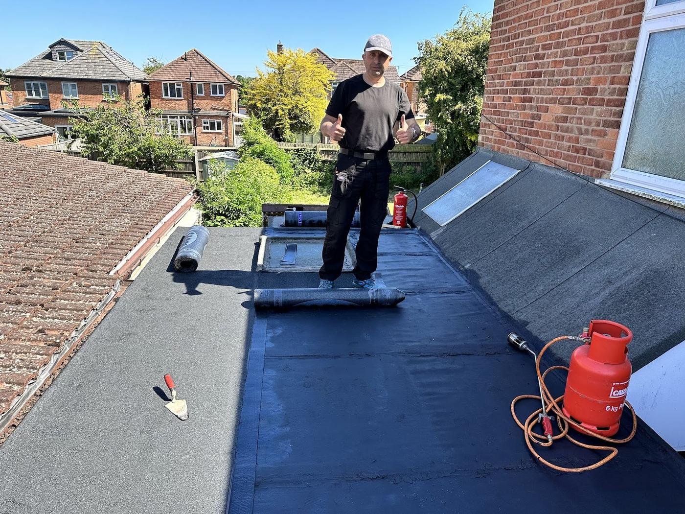 Norman on a newly felted flat roof